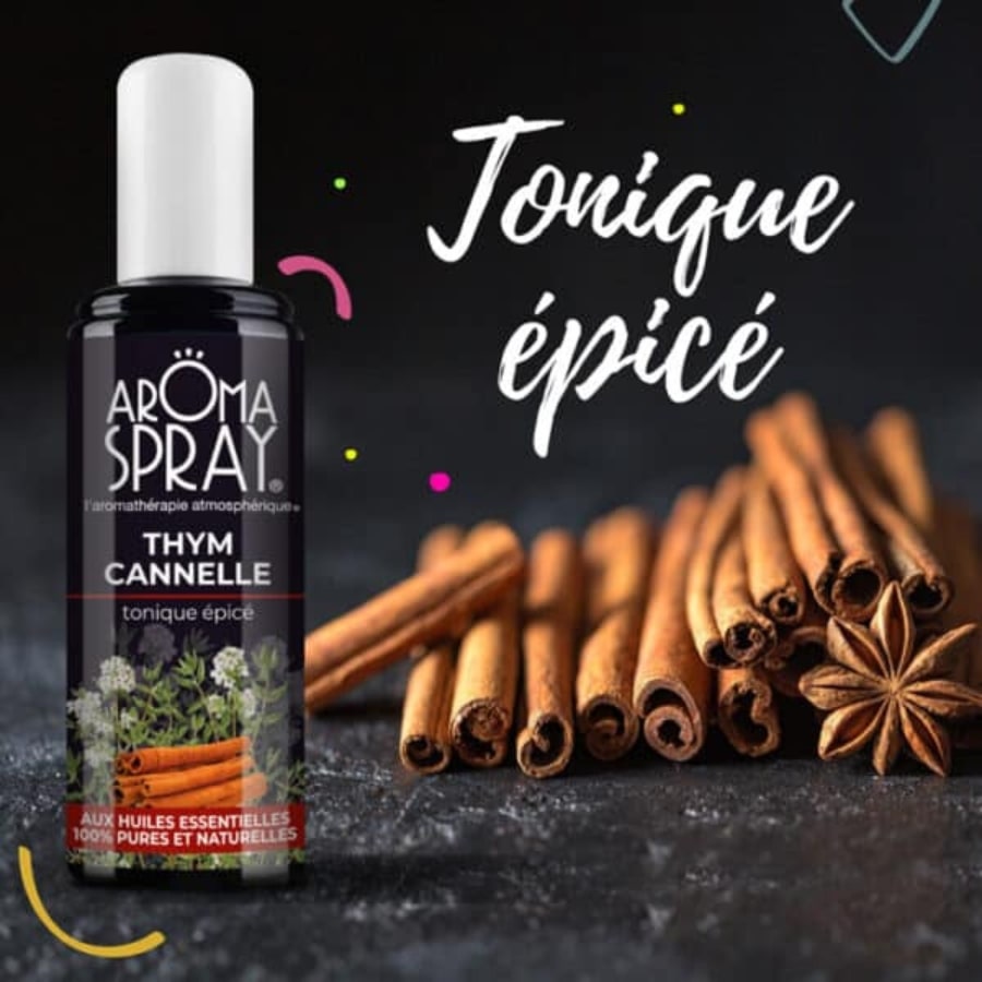 Un flacon de 100 ml de Aromaspray Thym Cannelle avec en fond des bâtonnets de cannelle, un clou de girofle et la mention tonique épicé