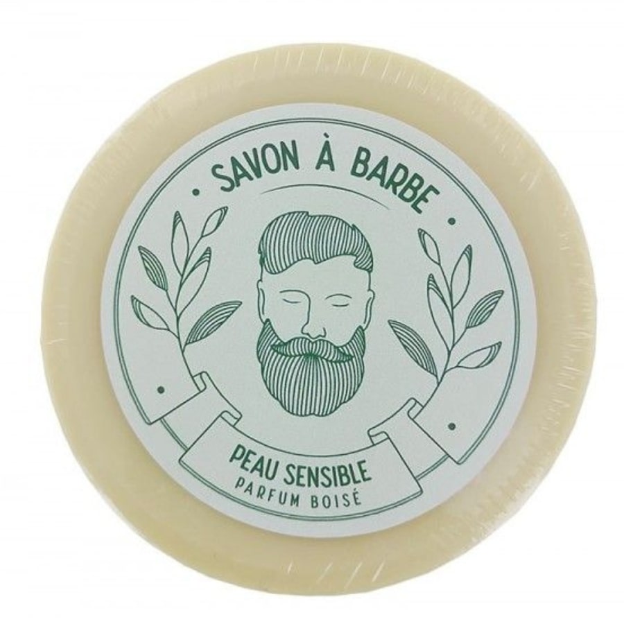 Un pain de savon à barbe pour peau sensible de 80g au parfum boisé